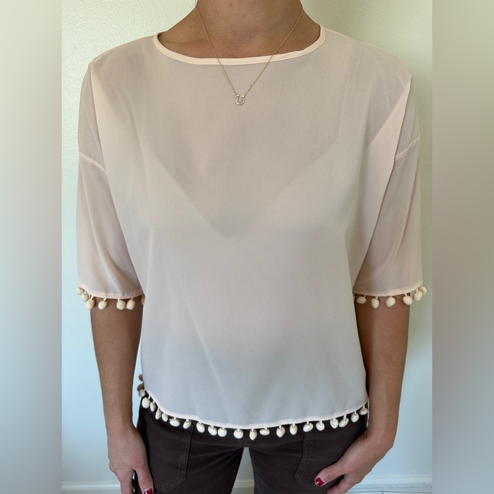 Peachy, pink French connection top with pom-pom tassels size small